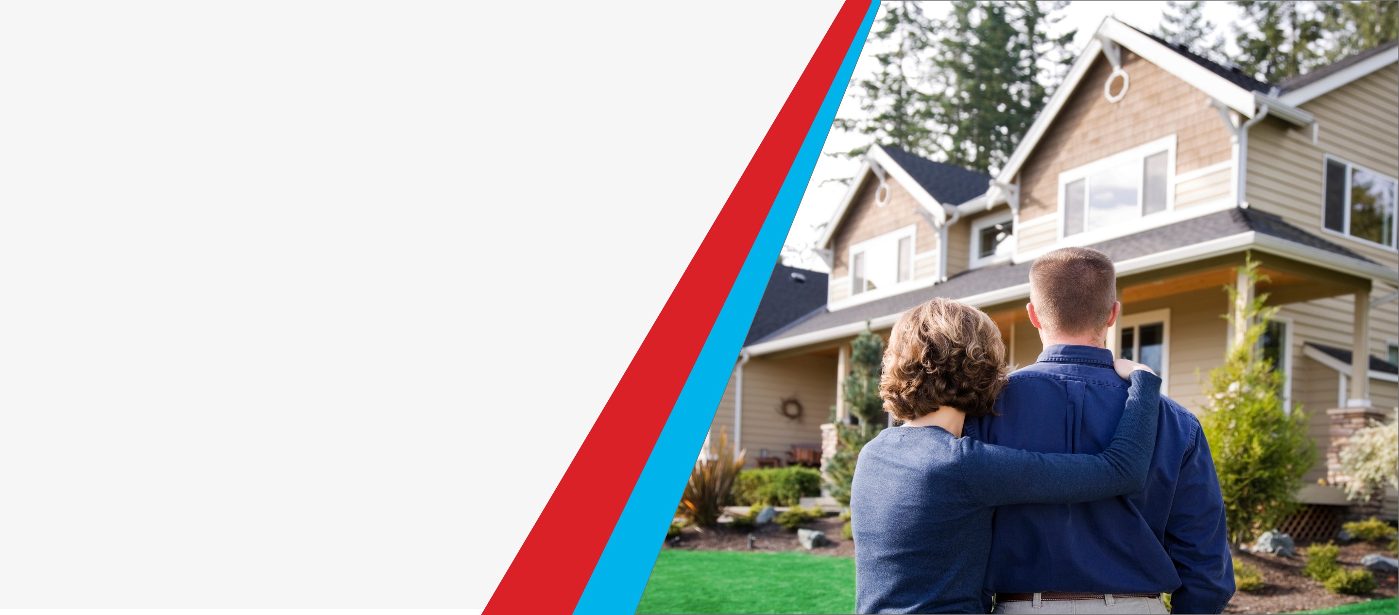 Couple looking at their home's exterior