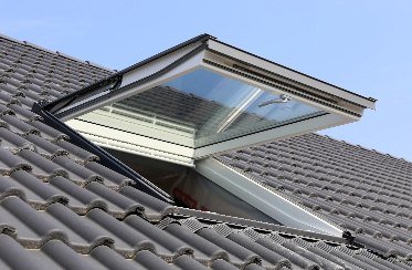 An exterior view of an open skylight