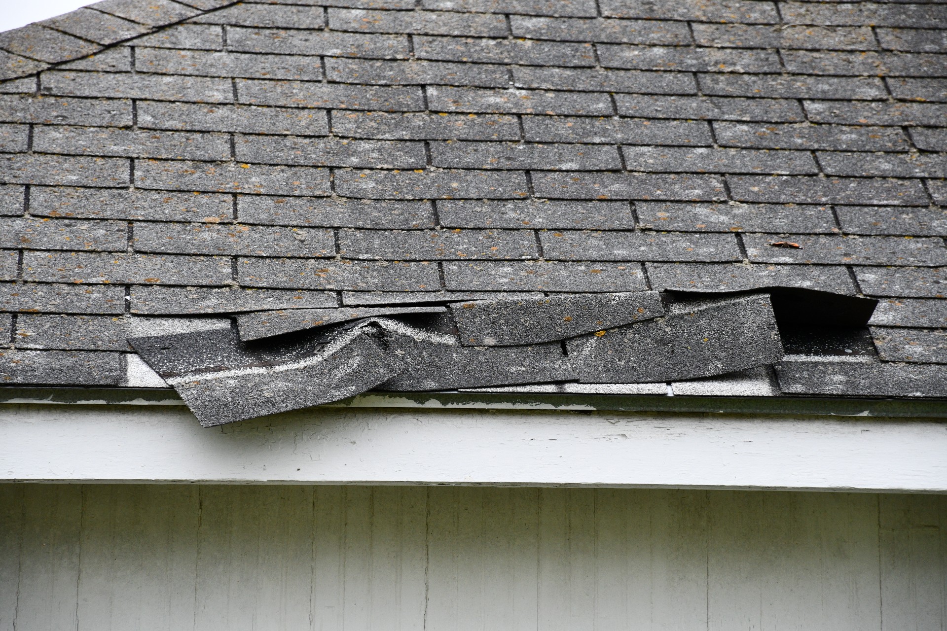 cracked shingles that need replacement